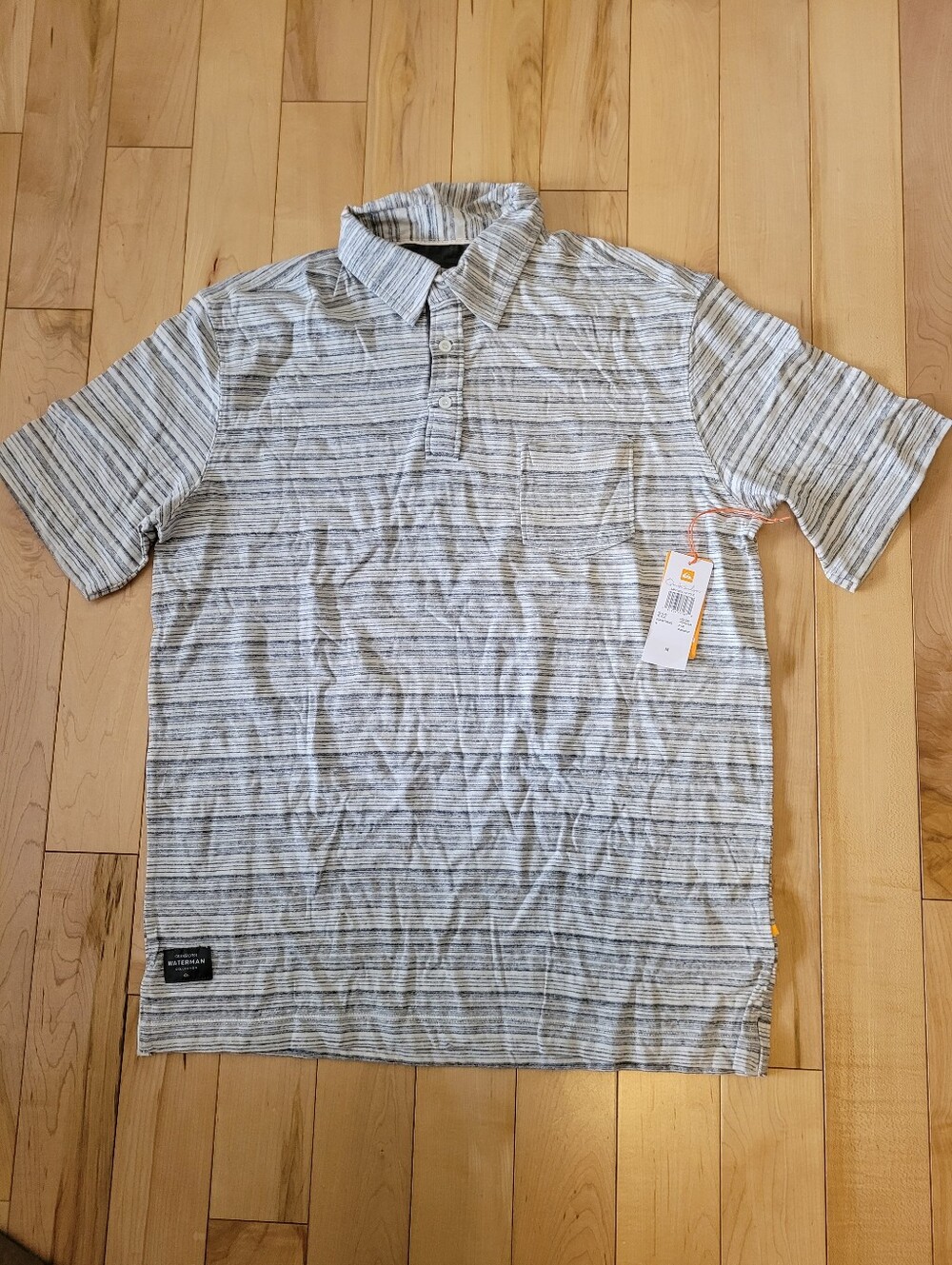 Brand new Quiksilver men's size medium polo shirt